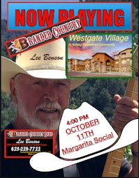 a poster with a man in a cowboy hat playing a guitar