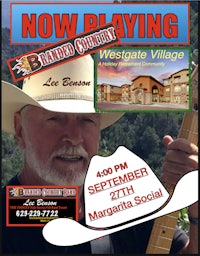 a poster with a man in a cowboy hat and a guitar